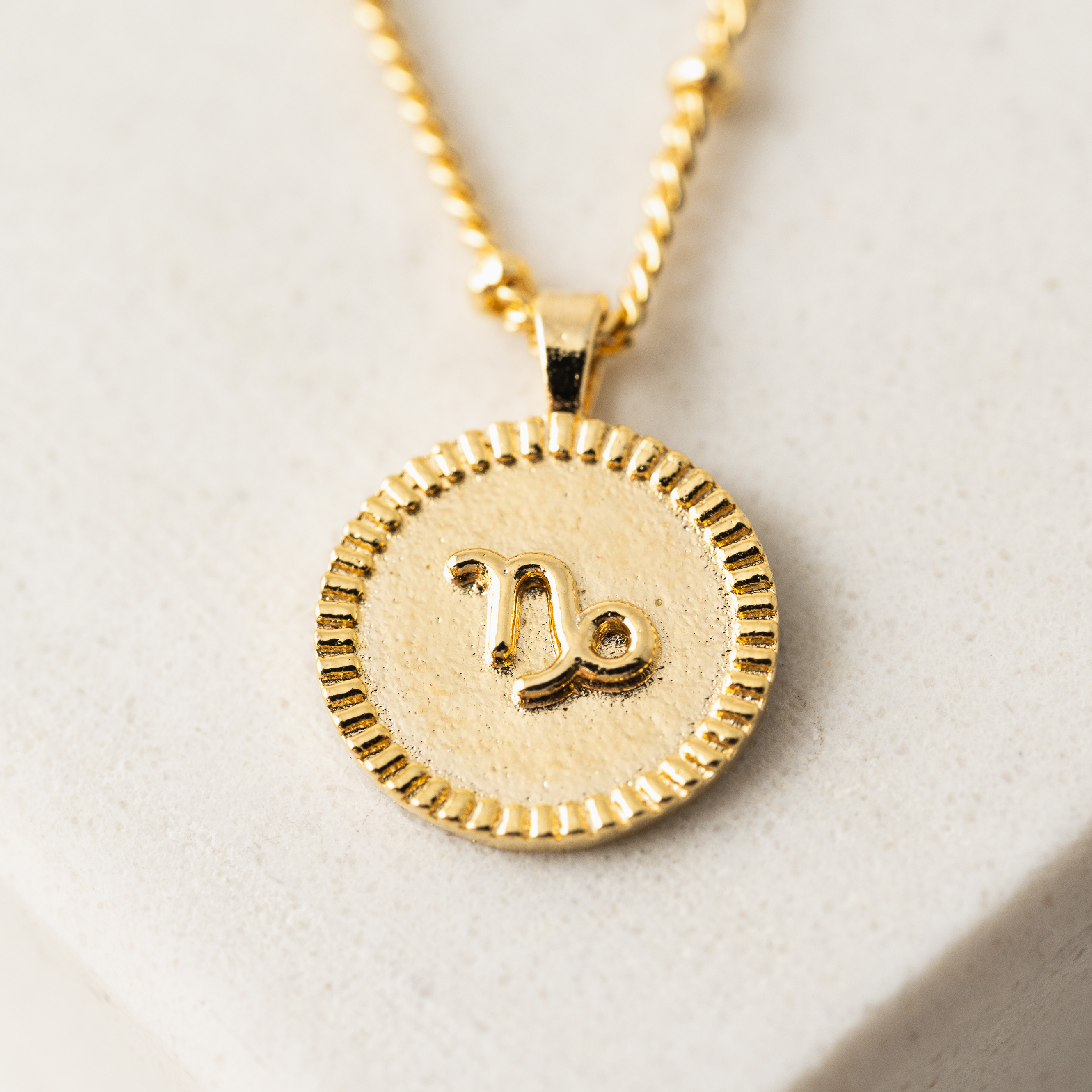Picture of Capricorn Horoscope Necklace - Gold