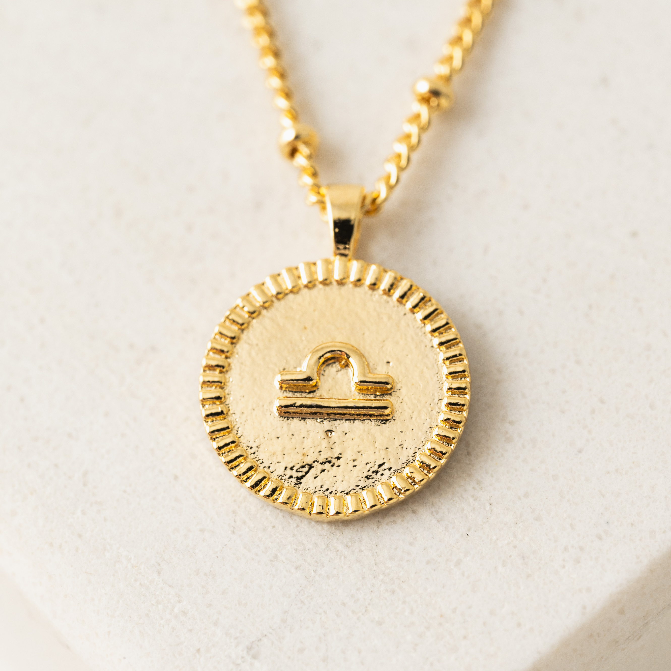 Picture of Libra Horoscope Necklace - Gold