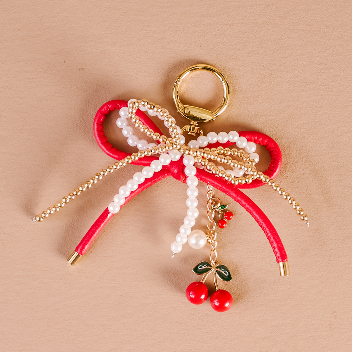 Picture of Layered Bows Bag Charm-Cherry Bliss