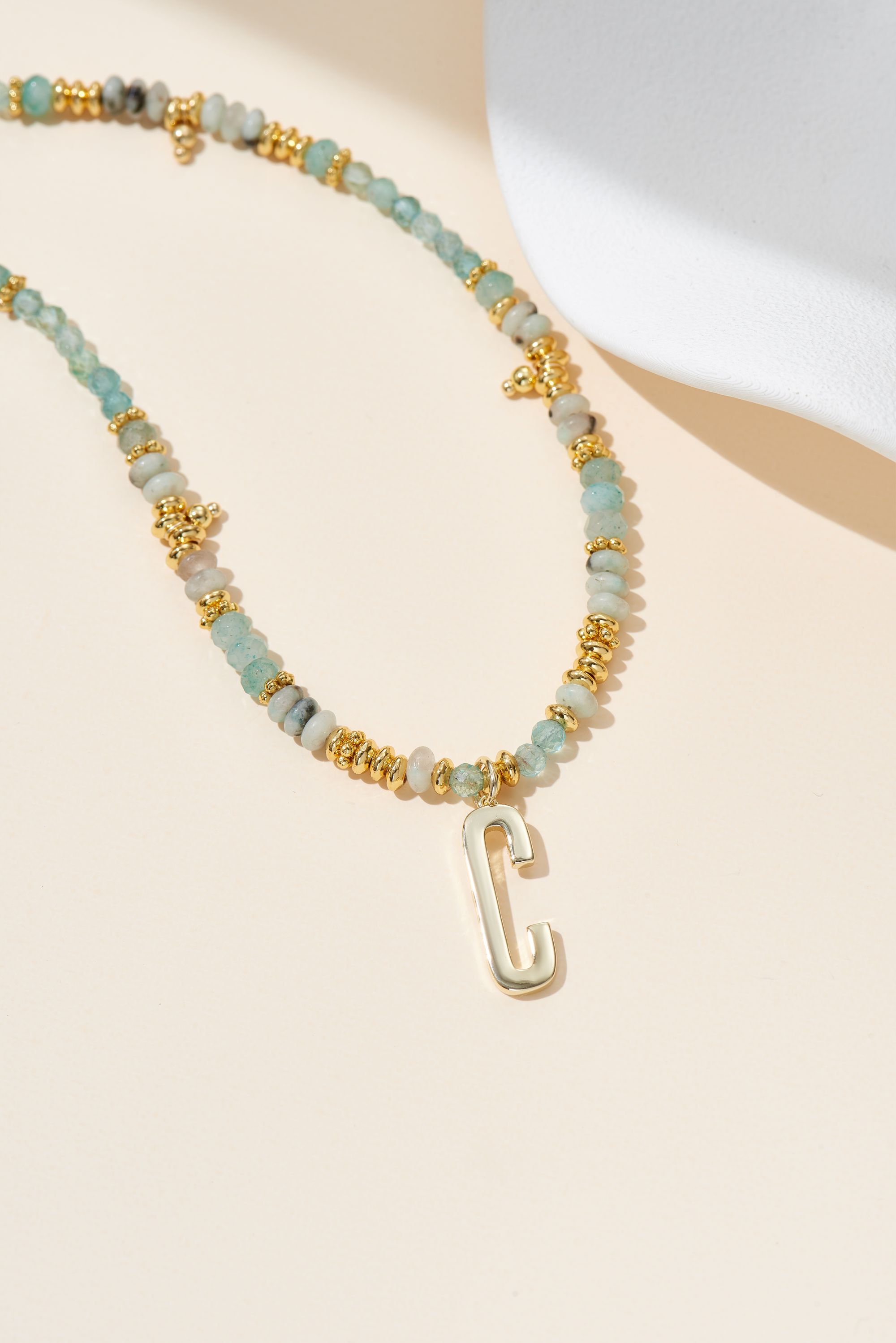 Picture of 26pc gold apatite rock your letter initial necklac