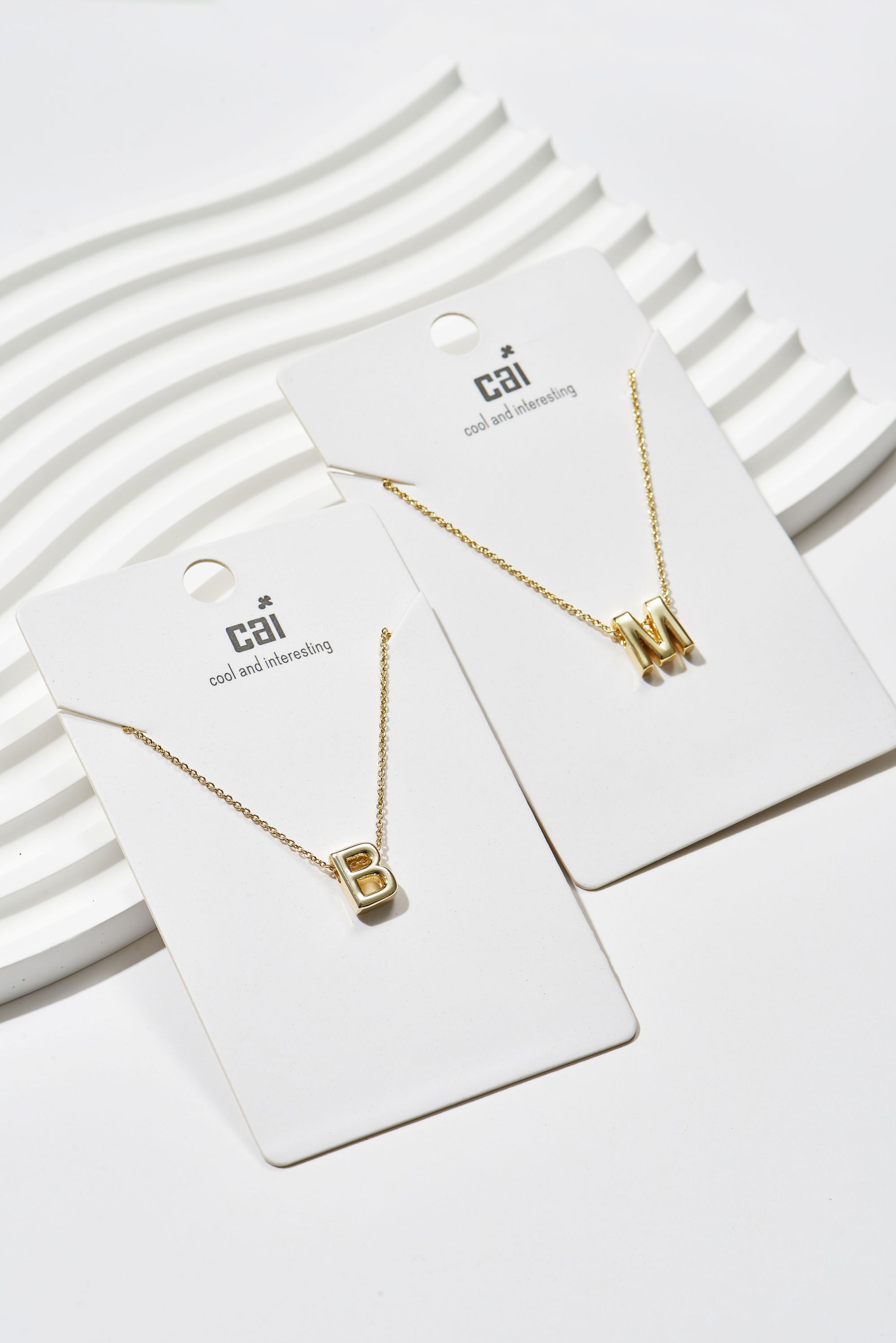 Picture of 26pc gold code of you block letter initial necklac