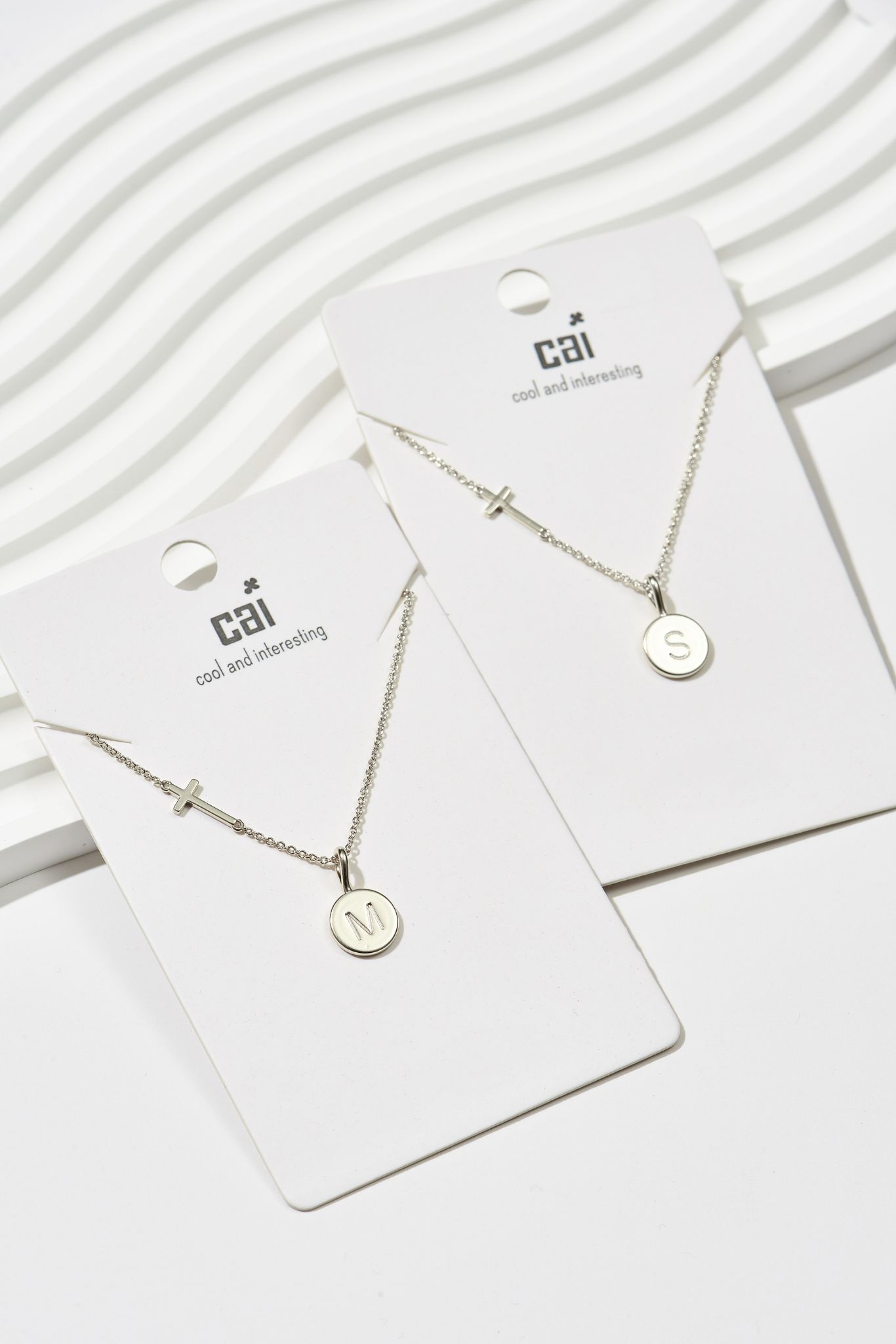 Picture of 26pc silver simple blessing disc initial necklace