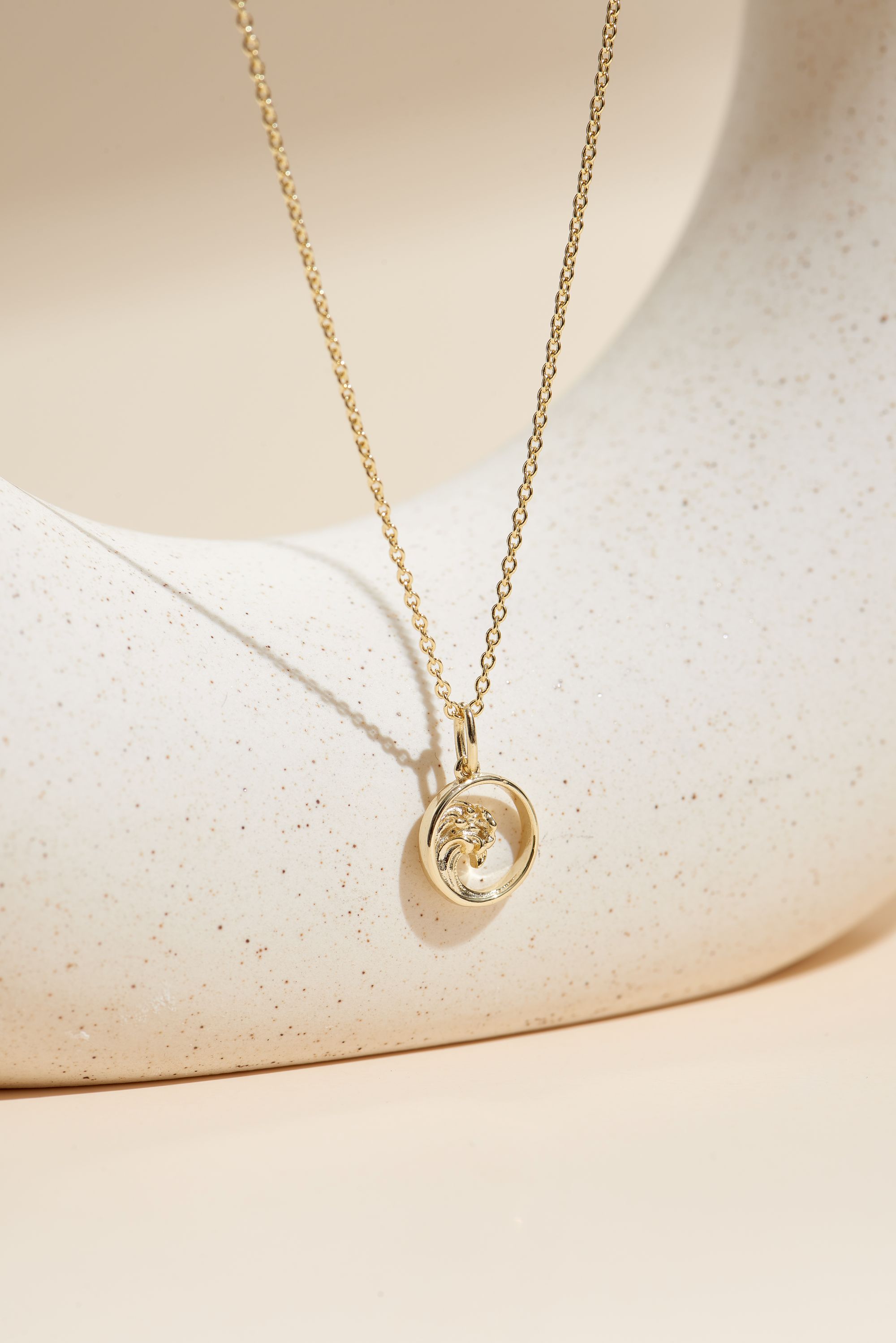 Picture of gold wish and wonder ocean waves necklace