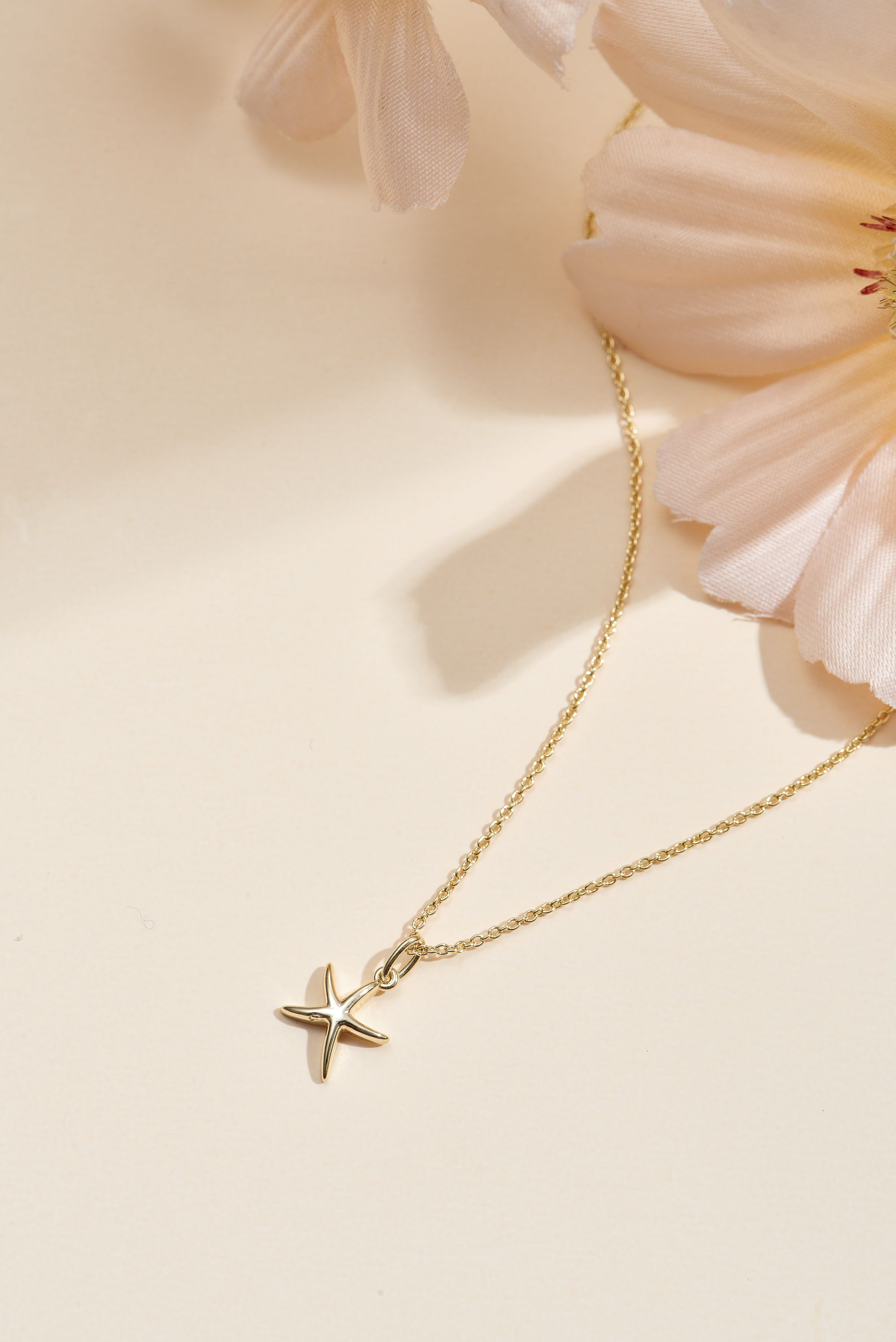 Picture of gold wish and wonder sea star necklace