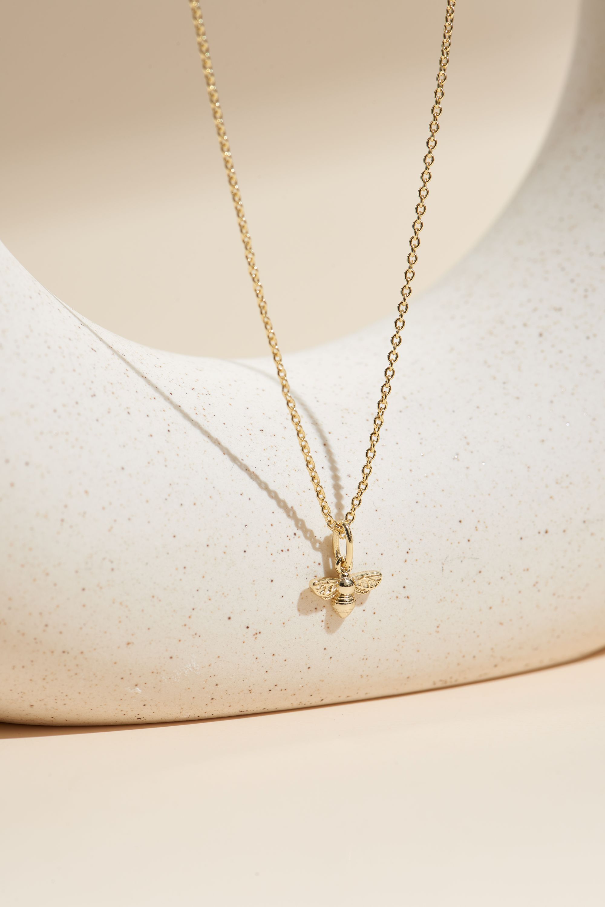 Picture of gold wish and wonder bee necklace