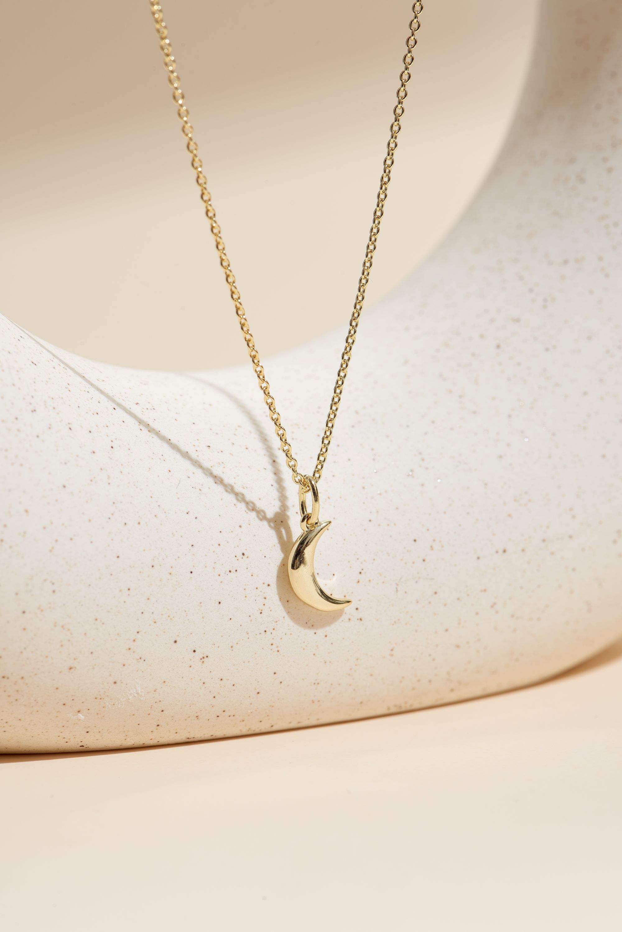 Picture of gold wish and wonder cresent moon necklace