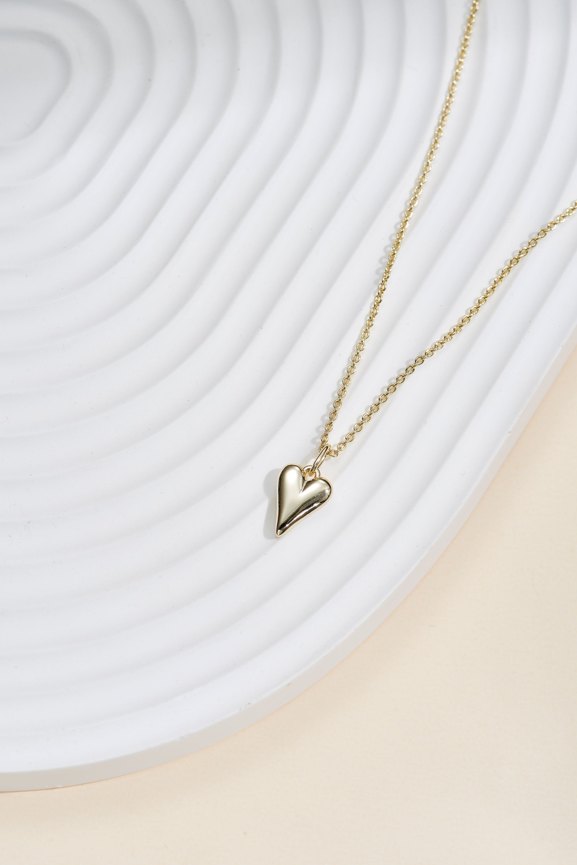 Picture of gold wish and wonder full heart necklace