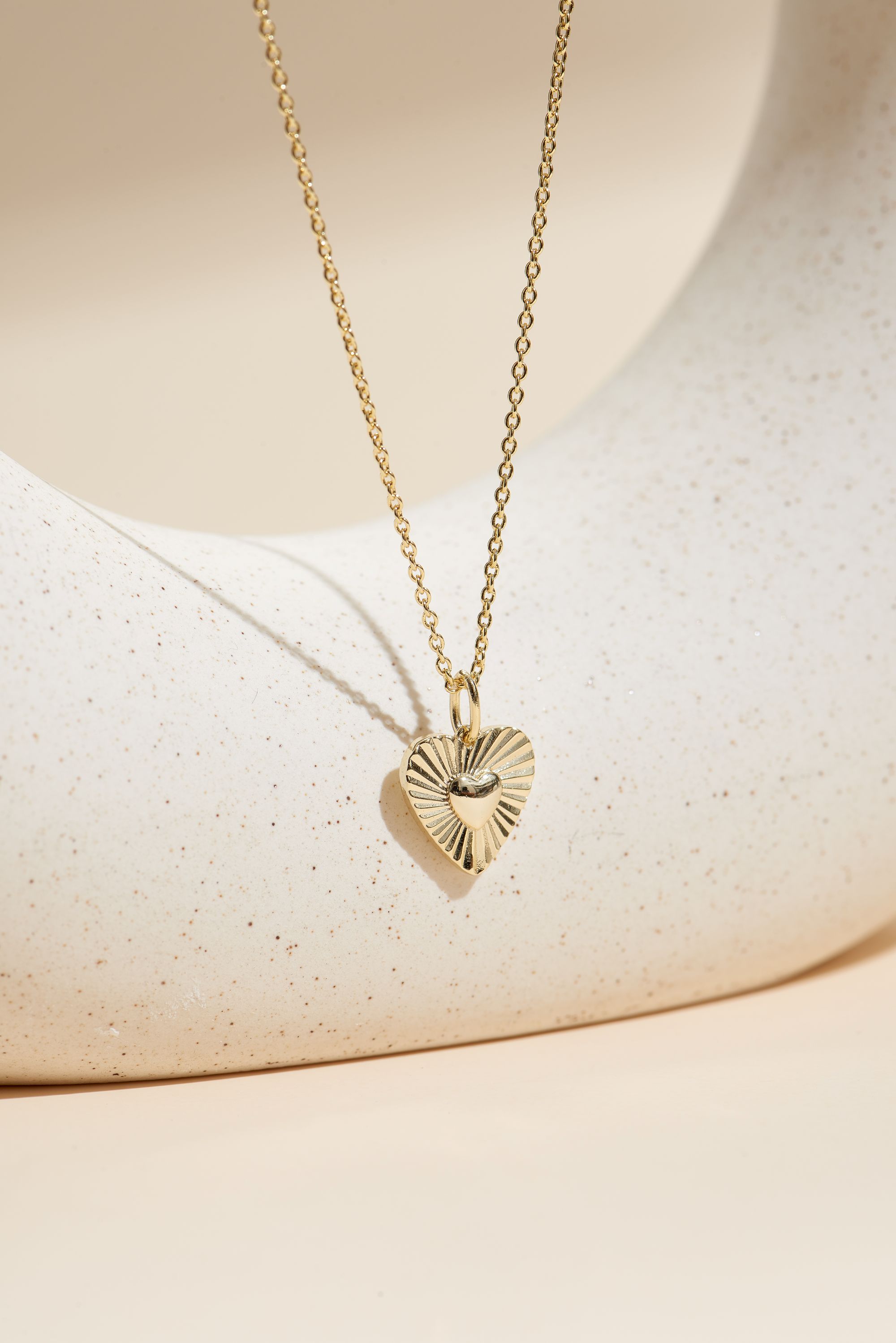 Picture of gold wish and wonder sunburst heart necklace