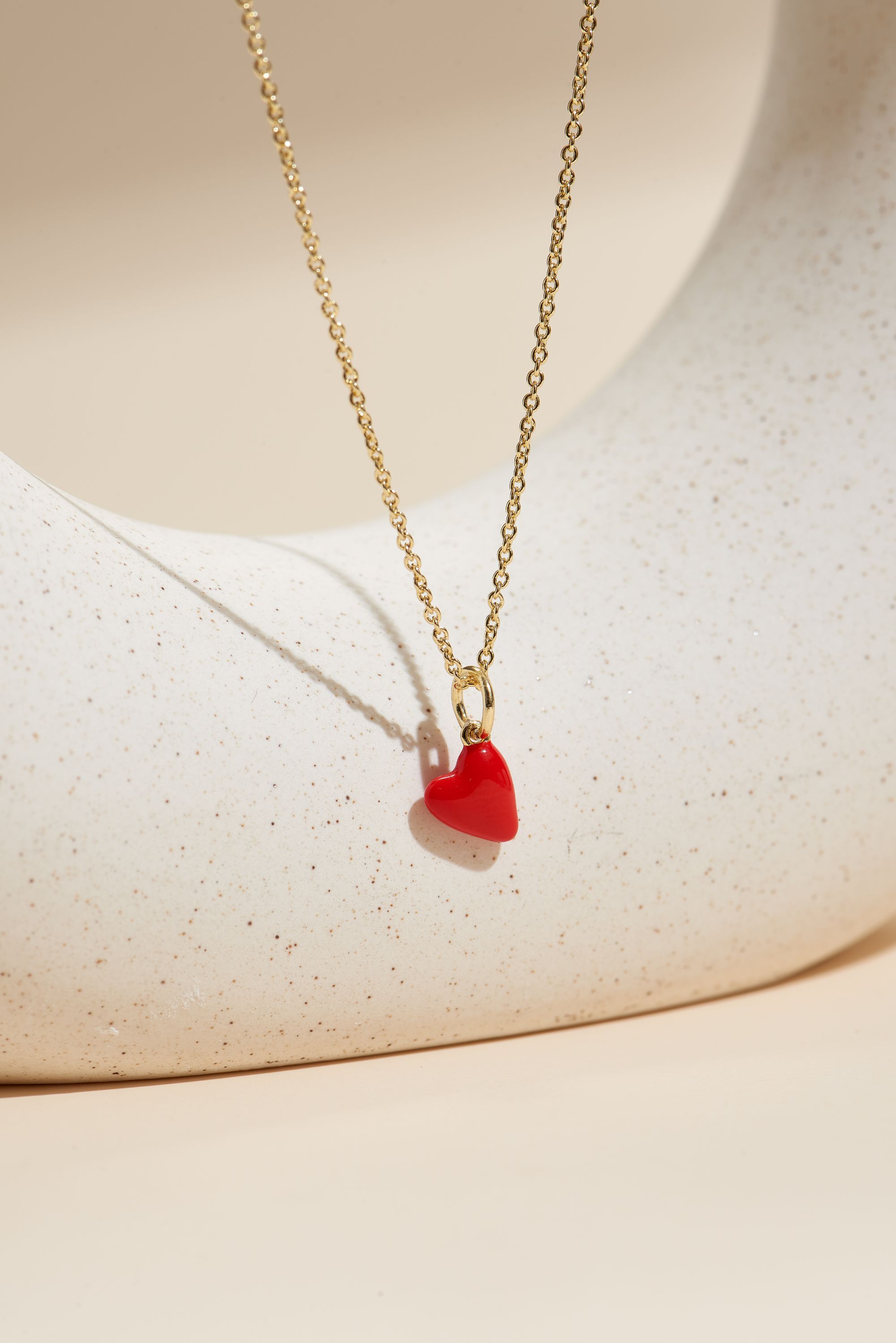 Picture of gold wish and wonder red heart necklace