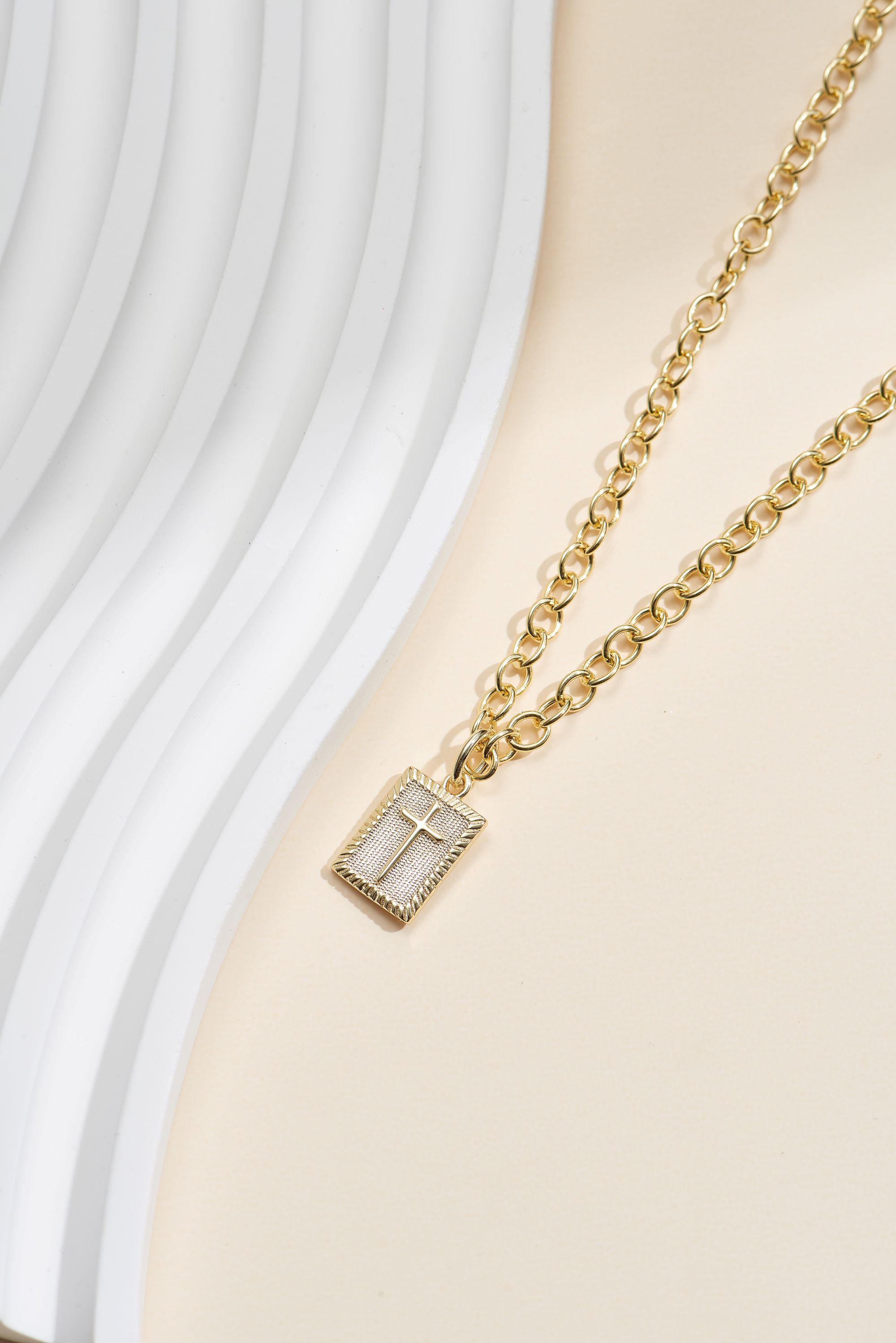 Picture of gold wish and wonder medallion cross necklace
