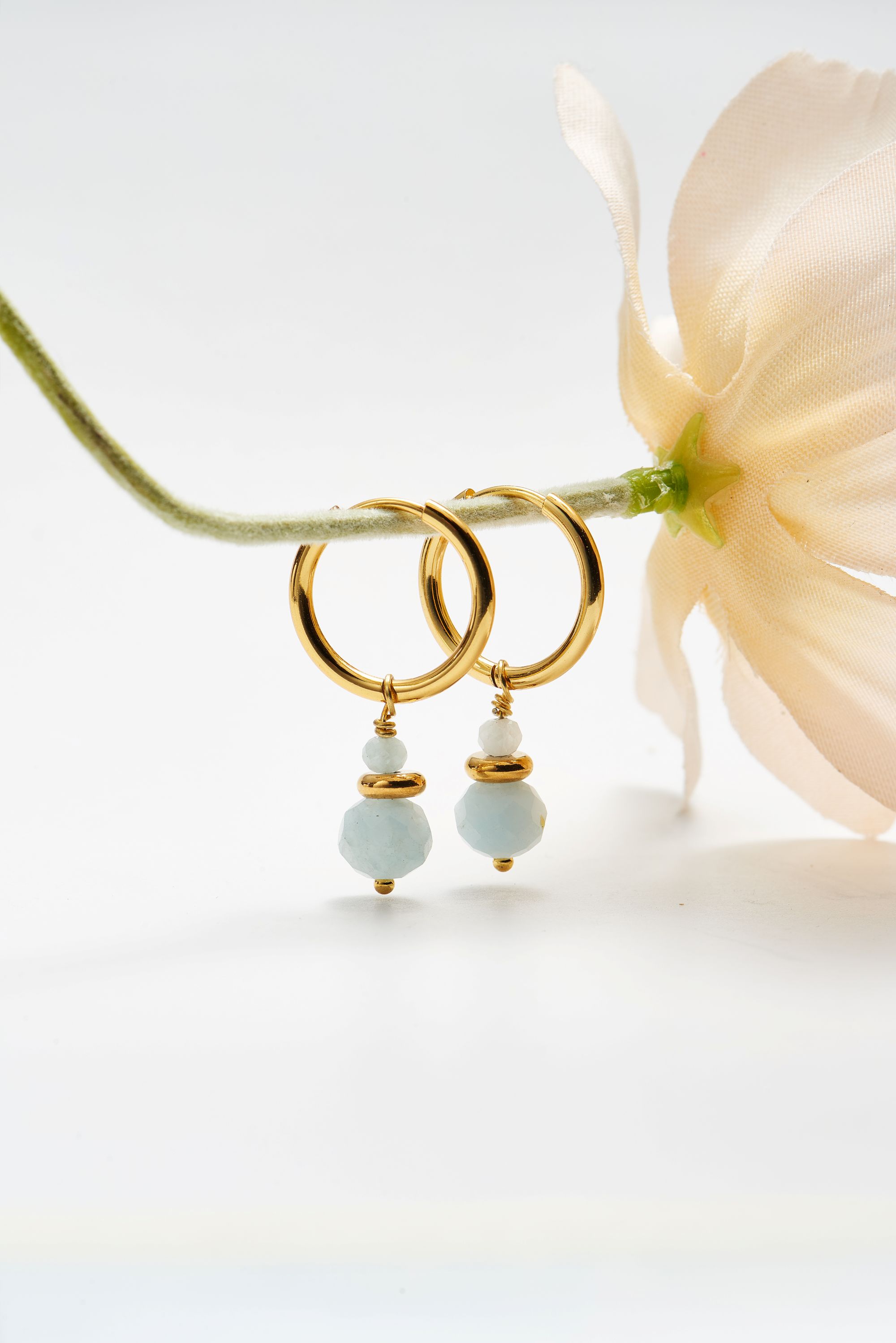Picture of gold round aquamarine hoop + gem earrings
