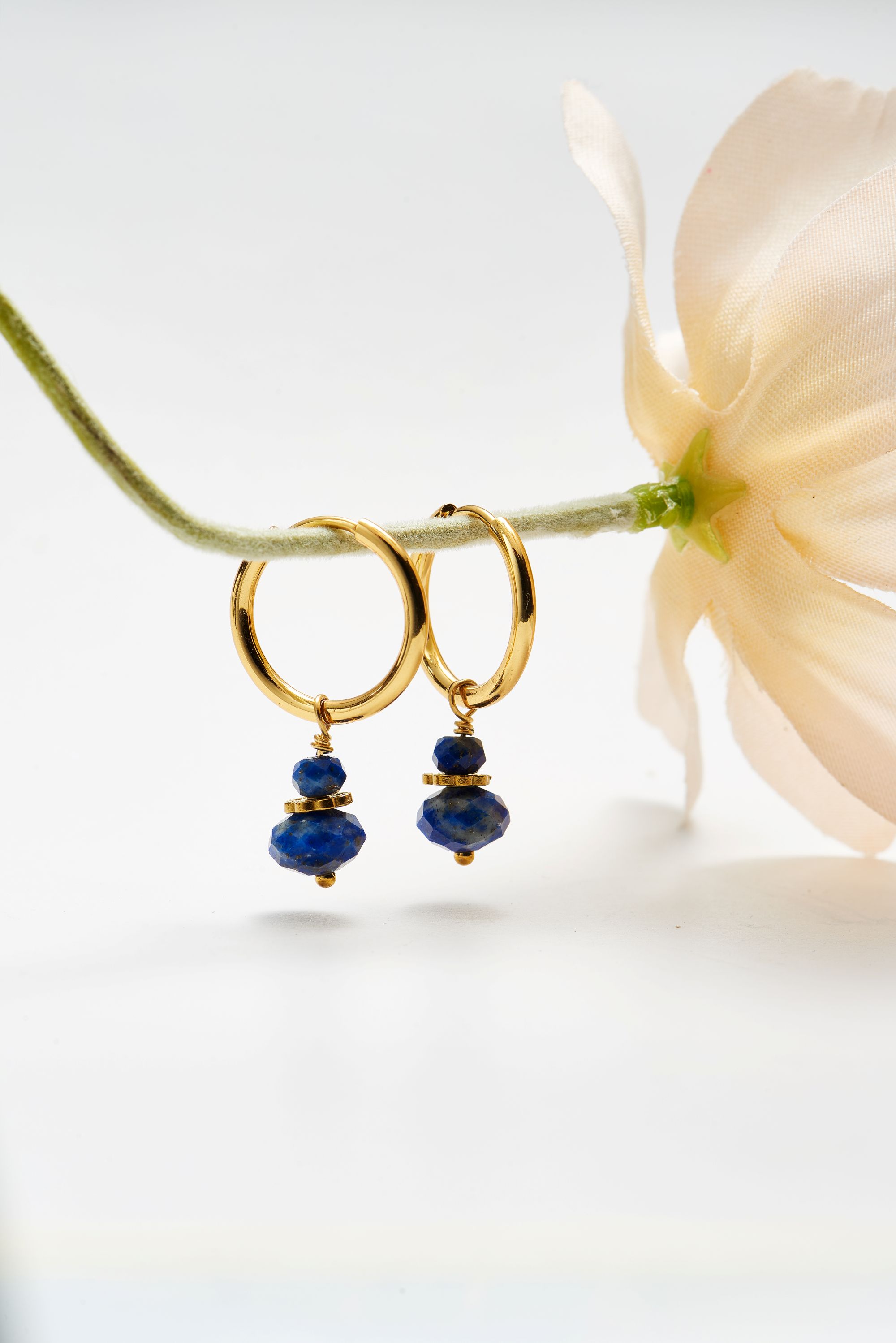 Picture of gold round lapis hoop + gem earrings
